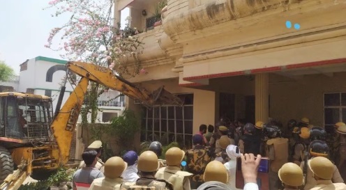 # Bulldozers ran at rioters' house in UP